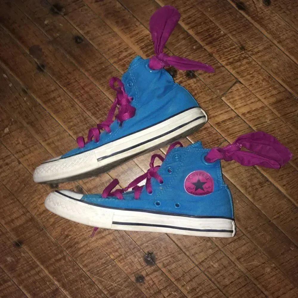 Converse blue and purple bow high top sneakers